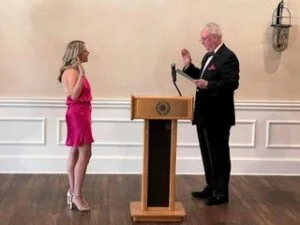 The Honorable Bernard E. DeLury, Presiding Judge of Criminal Court, swearing in Melissa Rosenblum